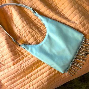 Silver purse with rhinestone tassels